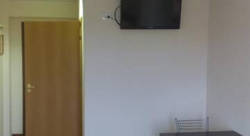 Фото номера Двухместный номер с 2 отдельными кроватями и душем Гостевой дом Severniy Kristall г. Урень 5